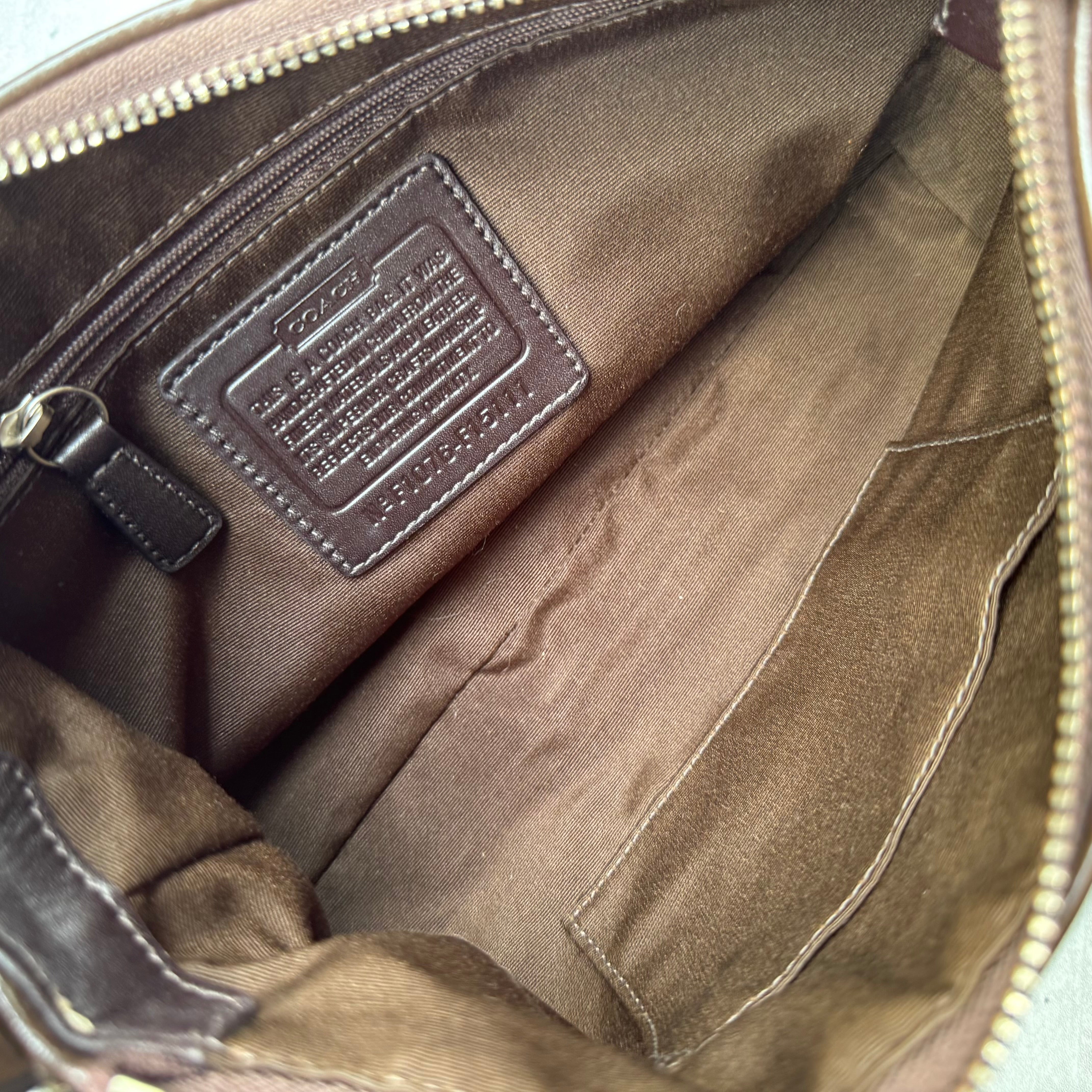 Coach Signature Stripe Shoulder Bag in beige and brown monogram canvas with dark brown leather trim and detachable strap.