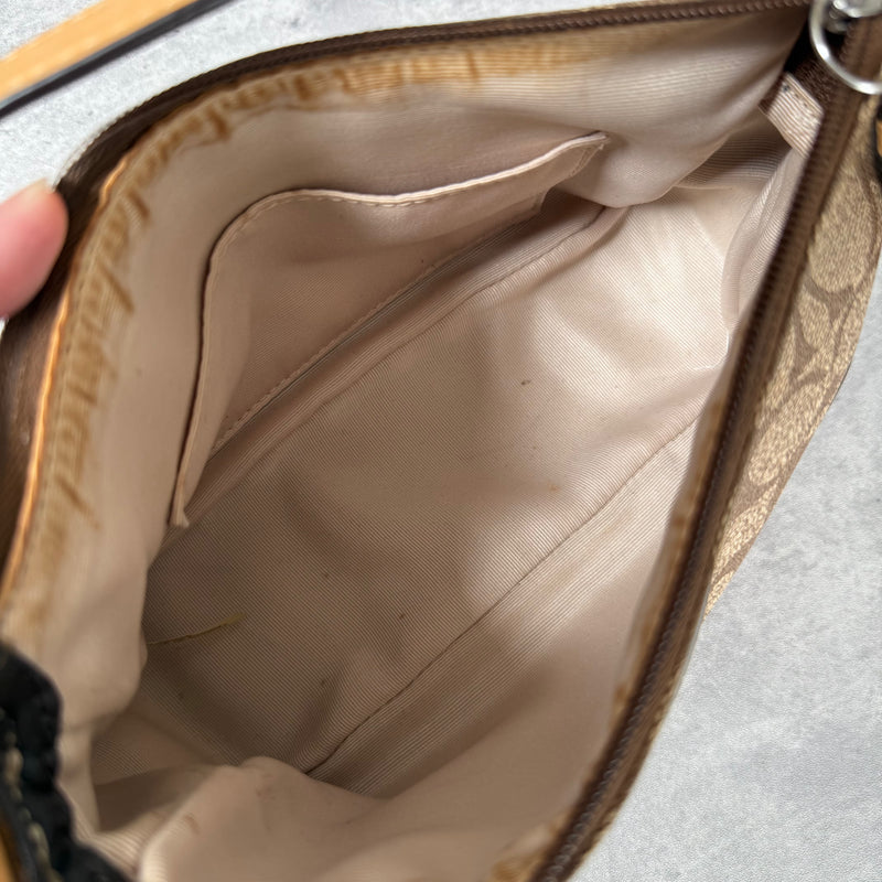 Coach Signature Sufflette Leather Shoulder Bag in beige with monogram canvas, tan leather trim, zip-top closure, and interior slip pocket