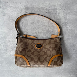 Coach Signature Sufflette Leather Shoulder Bag in beige with monogram canvas, tan leather trim, zip-top closure, and interior slip pocket