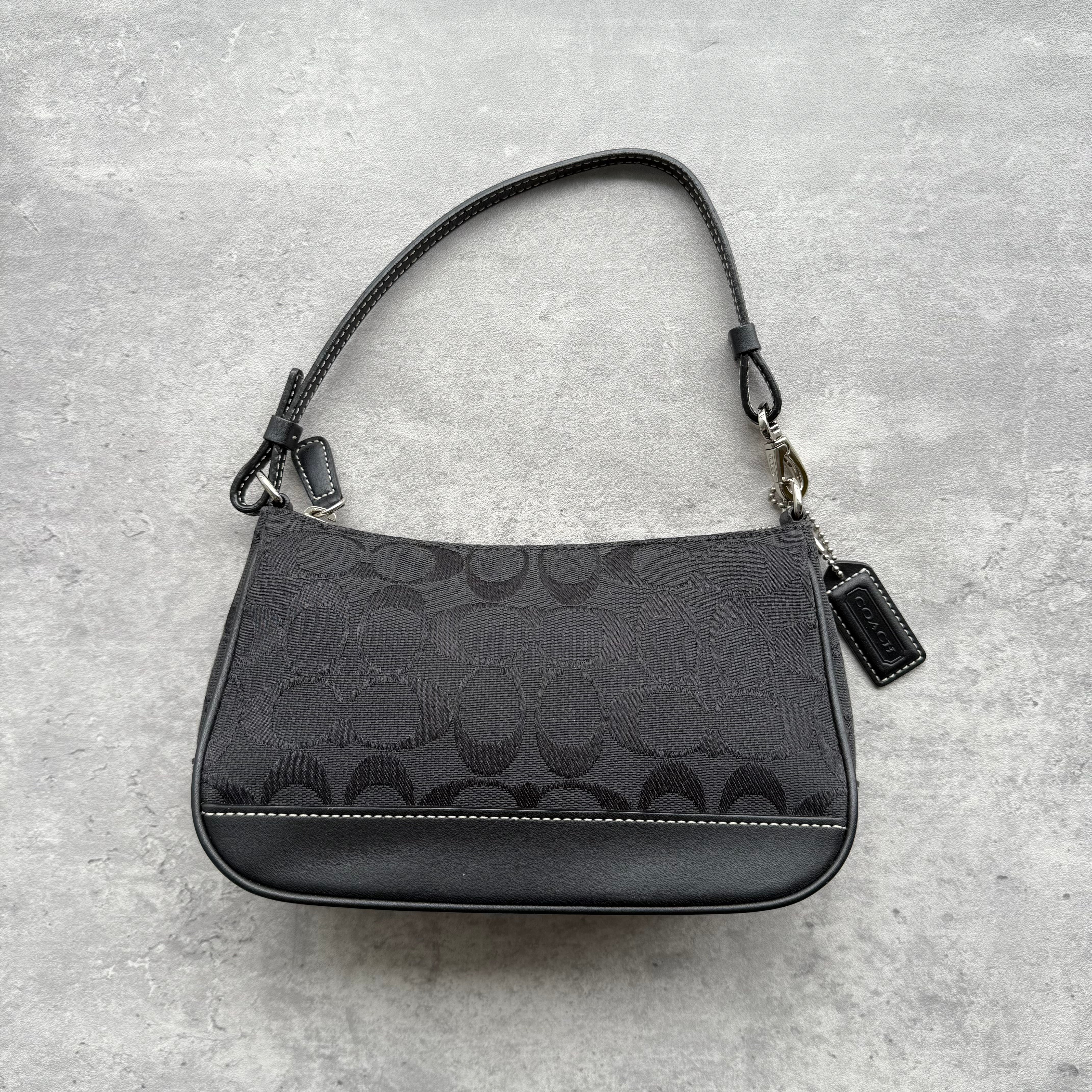 Coach Y2K Demi Shoulder Bag in black signature jacquard with leather trim and silver-tone hardware.