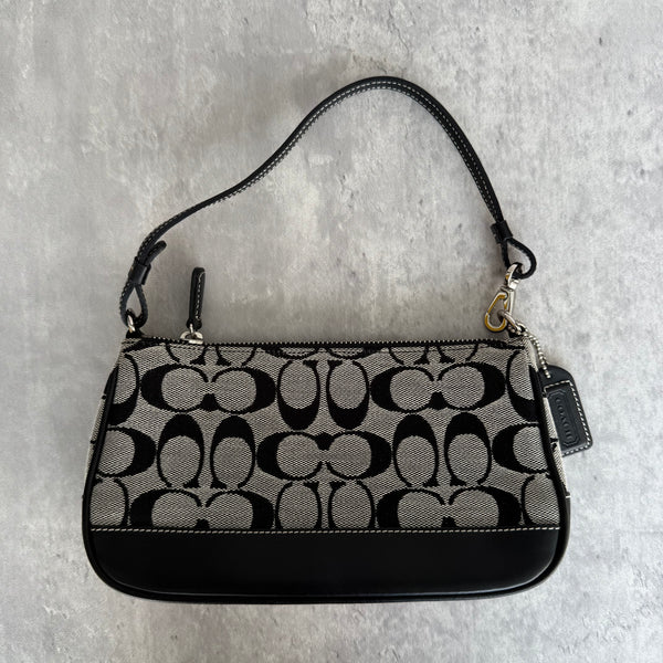 Coach Y2K Demi Shoulder Bag Grey/Black, featuring signature jacquard canvas, black leather trim, and silver-tone hardware with zip-top closure