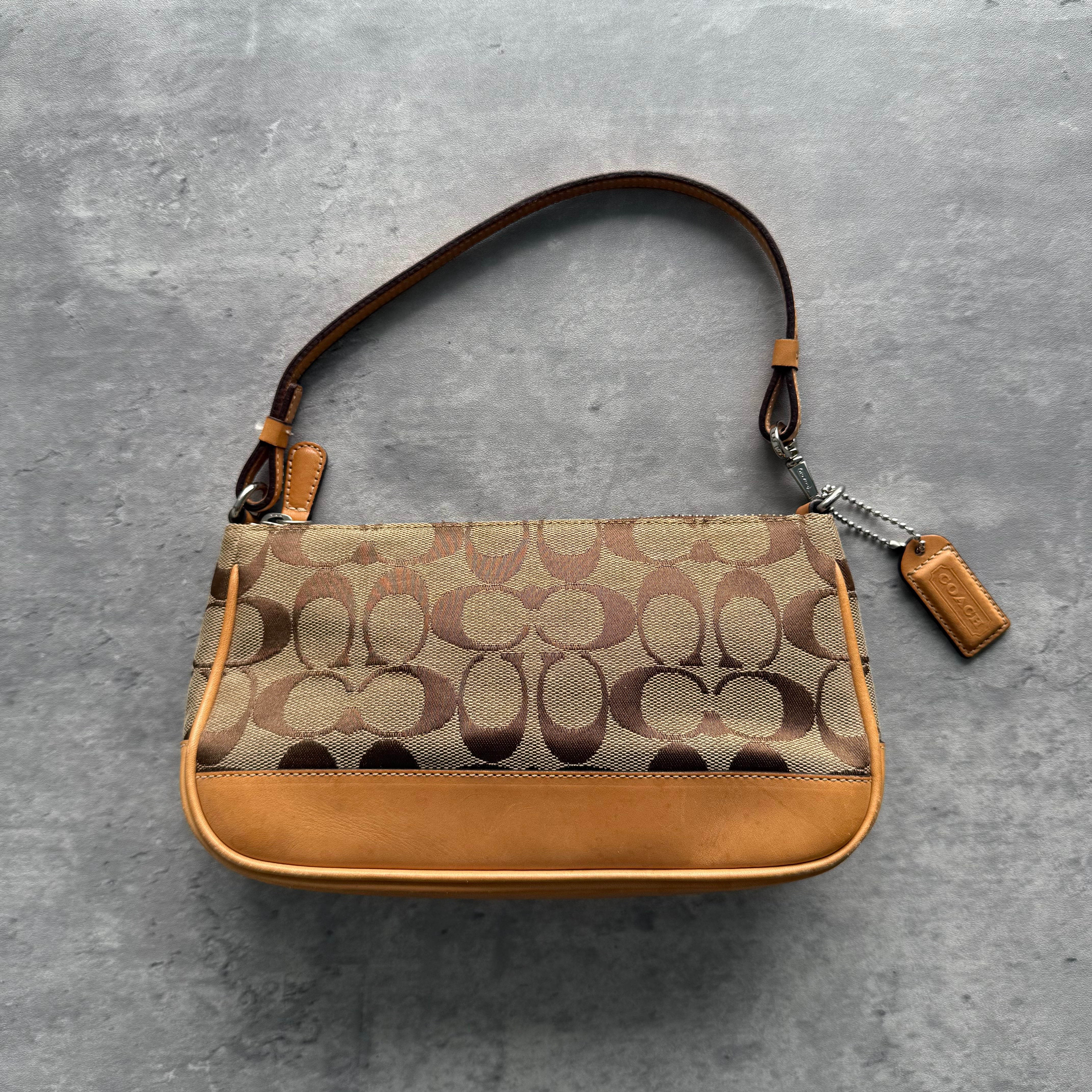 Coach Y2K Demi Shoulder Bag in tan signature canvas with leather trim and red fabric interior.