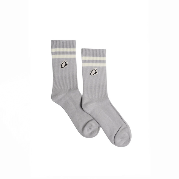 Corteiz Patch Socks in grey with white stripes and C* logo embroidery, mid-crew cotton blend.

