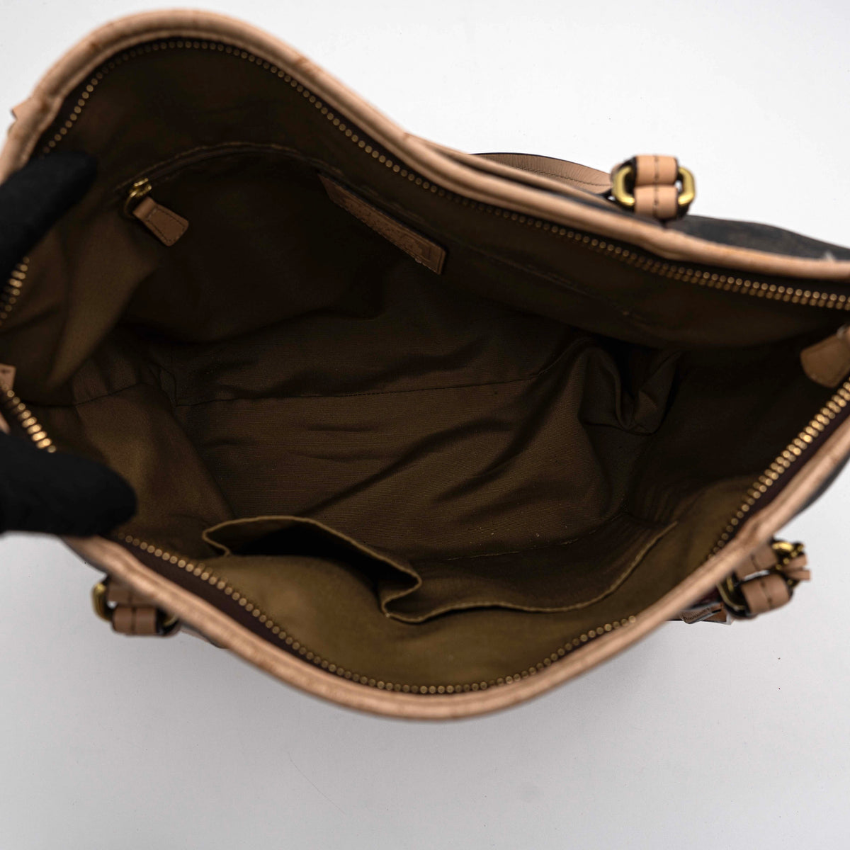 Coach Signature Peyton Pocket tote bag in brown canvas with tan leather trim, shown with both handles and detachable strap.