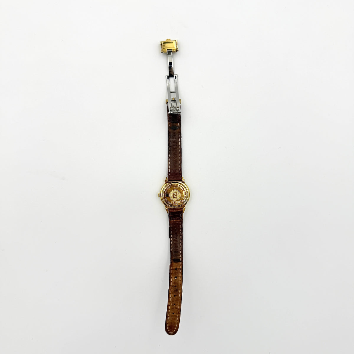 Fendi 350L Orologi Quartz Watch in gold with brown leather strap, displayed with original box and booklet.