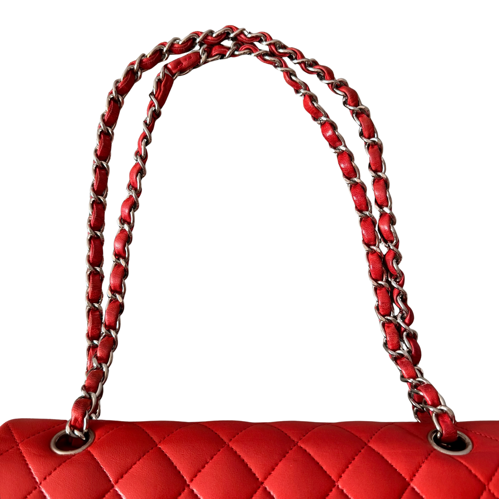 Chanel double flap shoulder bag in quilted red leather with silver-tone hardware and chain leather strap.