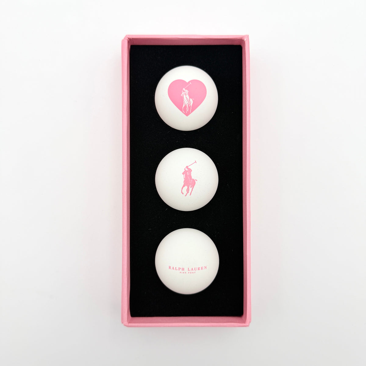 Ralph Lauren Pink Pony table tennis balls set of three, presented in a pink gift box with signature Polo designs.