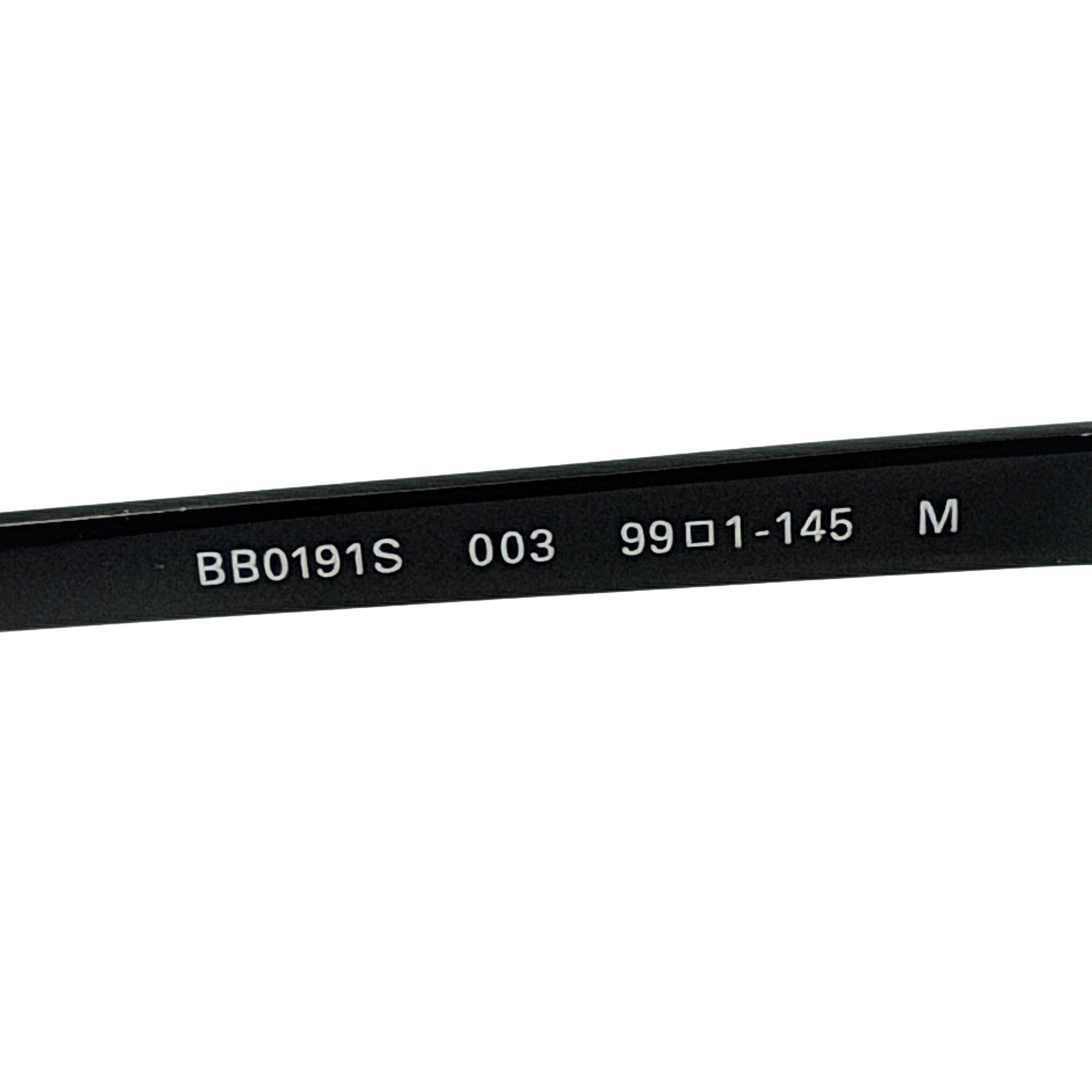 Balenciaga cat-eye sunglasses with purple mirrored lenses and black frame, featuring signature BB logo at the bridge.