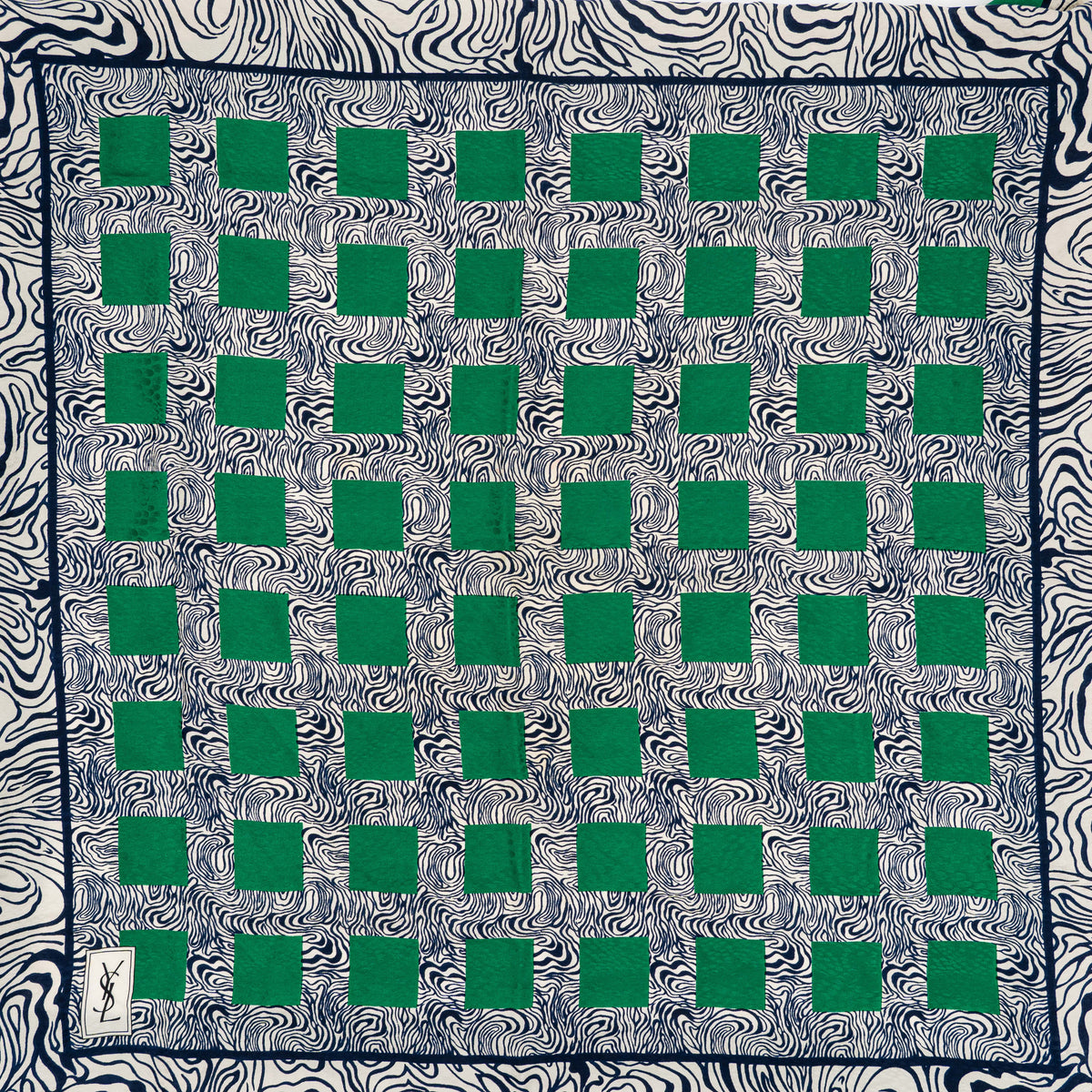 Yves Saint Laurent geometric silk scarf in green and black with abstract and square patterns, featuring a corner YSL label.