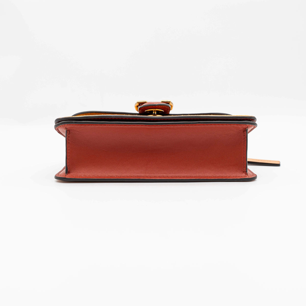 Coach Beat Crossbody Clutch 2Way in blush, tan, and red leather with brass hardware and detachable strap, displayed with chain handle.