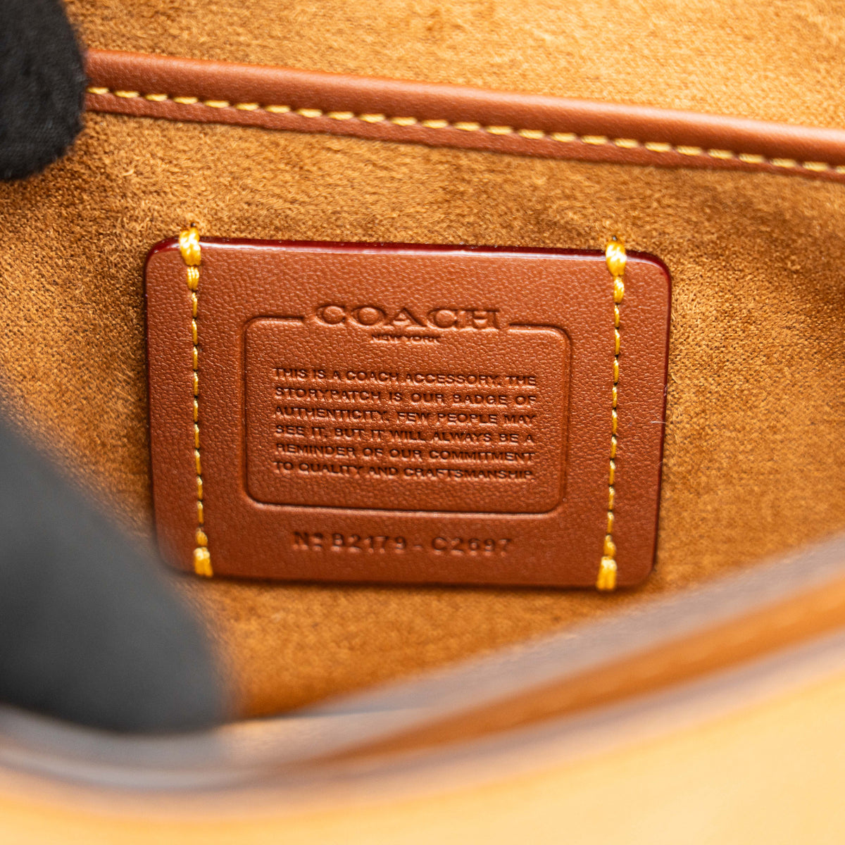 Coach Beat Crossbody Clutch 2Way in blush, tan, and red leather with brass hardware and detachable strap, displayed with chain handle.