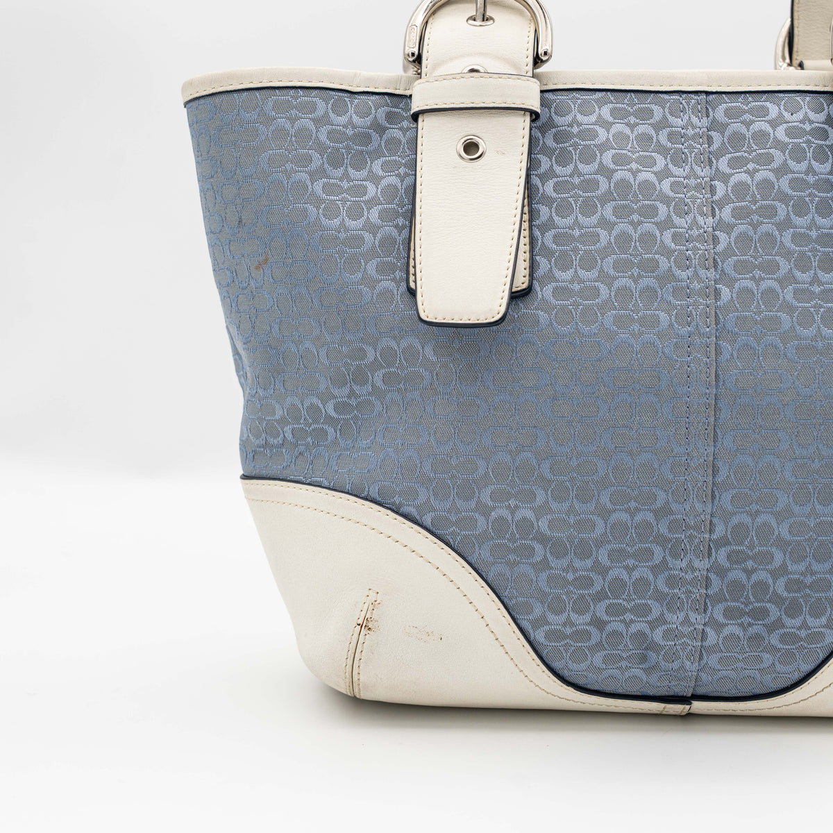 Coach Y2K Signature Soho Buckle Tote in light blue jacquard with white leather trim and silver-tone hardware.