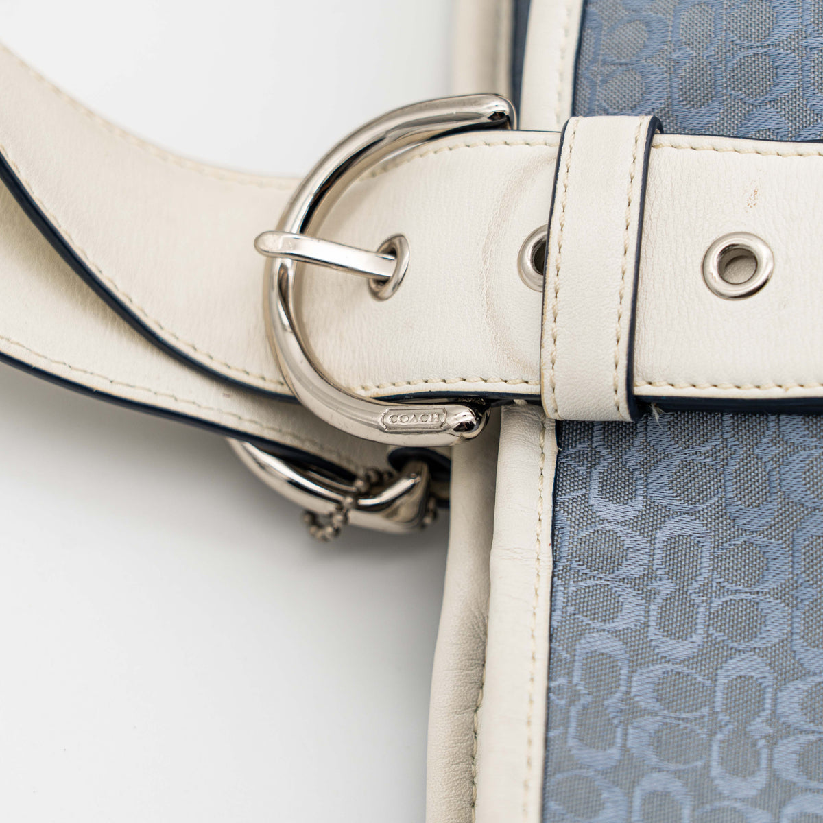Coach Y2K Signature Soho Buckle Tote in light blue jacquard with white leather trim and silver-tone hardware.