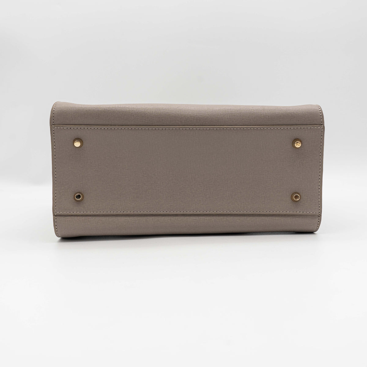 Furla grey Pin tote bag with top handles, gold hardware, and detachable strap against a white background.
