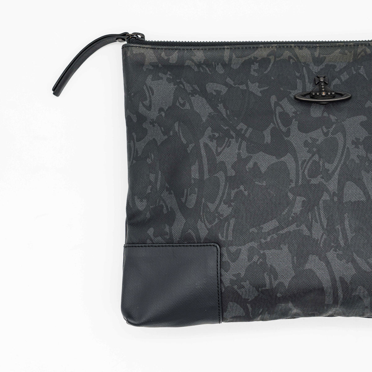 Vivienne Westwood clutch bag in grey and black graphic camouflage with matte black Orb logo and leather trim, styled against a white background.