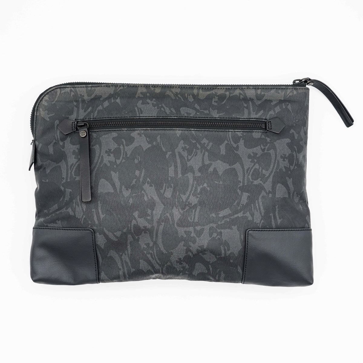 Vivienne Westwood clutch bag in grey and black graphic camouflage with matte black Orb logo and leather trim, styled against a white background.