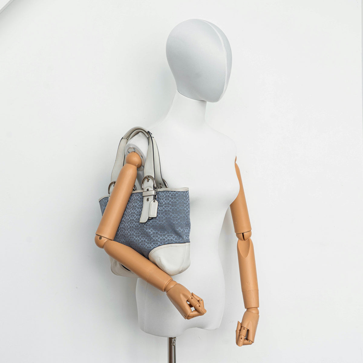 Coach Y2K Signature Soho Buckle Tote in light blue jacquard with white leather trim and silver-tone hardware.