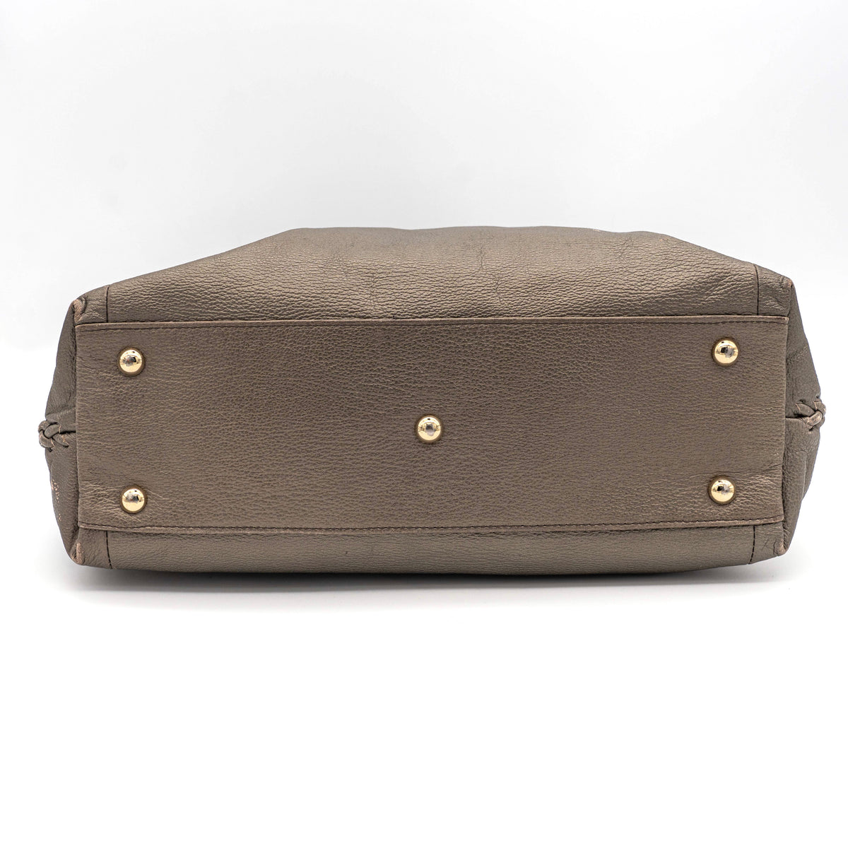 Furla taupe leather shoulder bag with gold hardware and braided detailing, photographed against a white background.