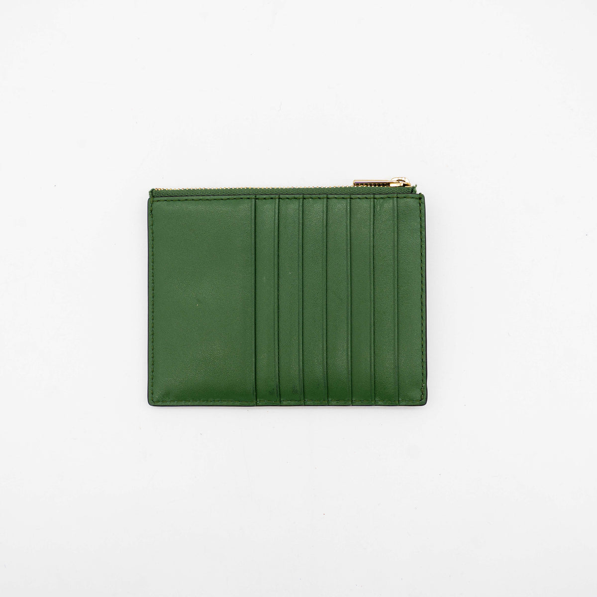 Furla Camelia S zipped card case in green leather with gold hardware and multiple card slots.