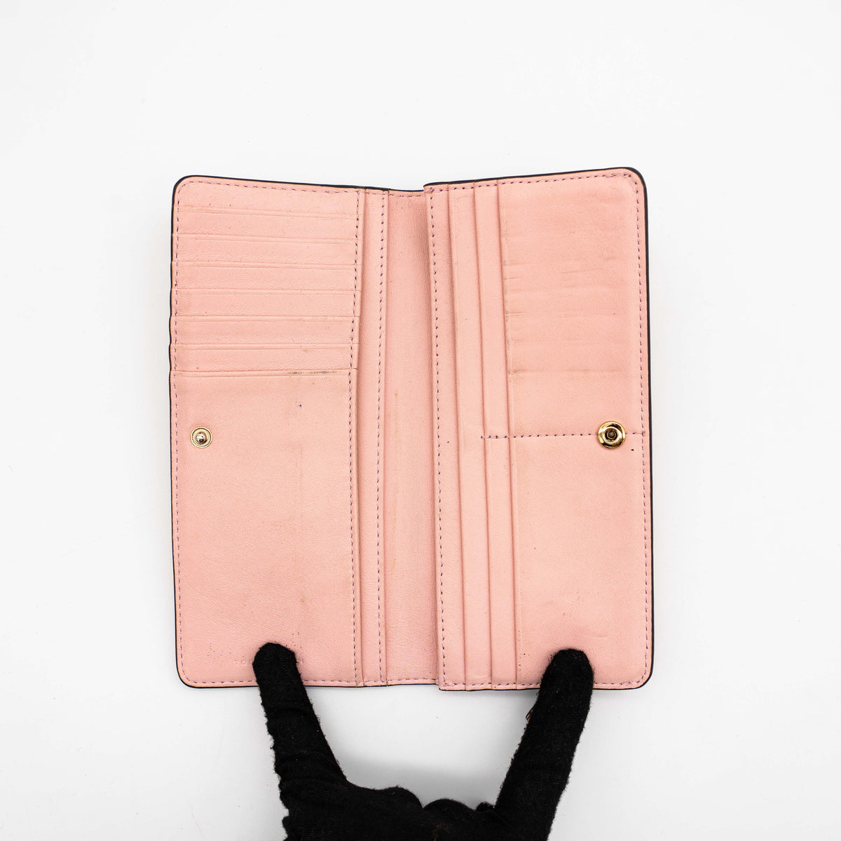 The Tory Burch Hicks Garden Party Wallet in multi-colour coated canvas with intricate floral print and gold logo detail.