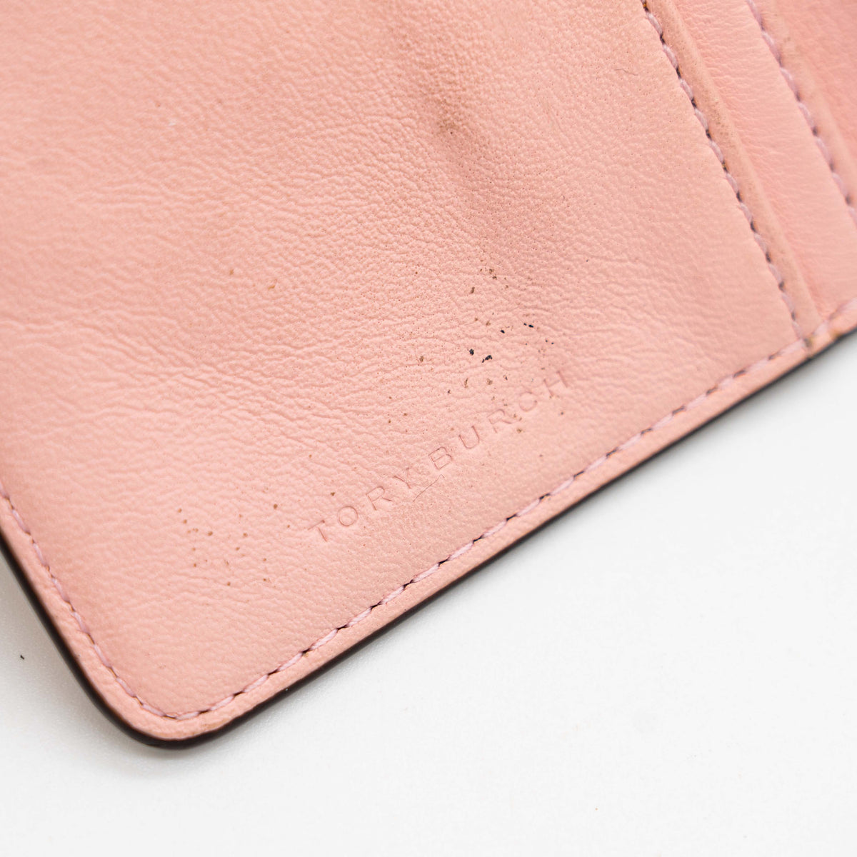 The Tory Burch Hicks Garden Party Wallet in multi-colour coated canvas with intricate floral print and gold logo detail.