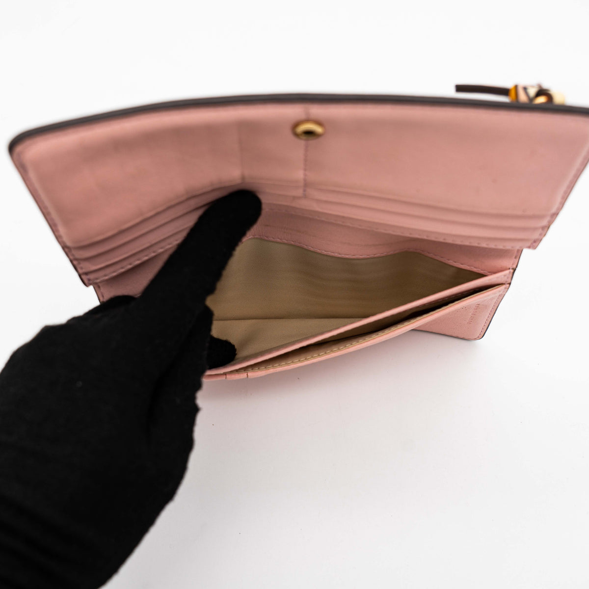 The Tory Burch Hicks Garden Party Wallet in multi-colour coated canvas with intricate floral print and gold logo detail.