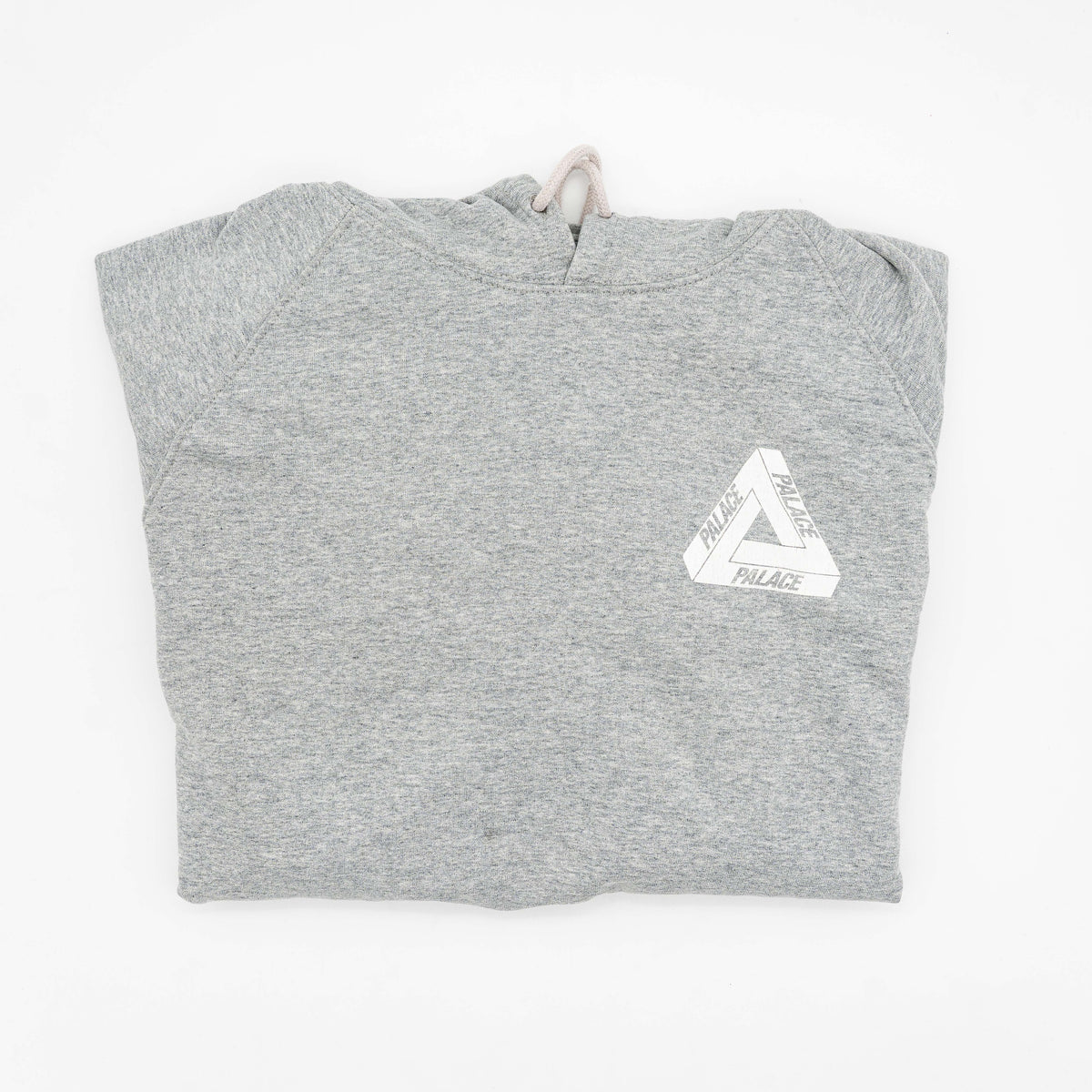 Palace grey pullover hoodie with tropical Tri-Ferg back graphic and white chest logo, laid flat on a neutral background.