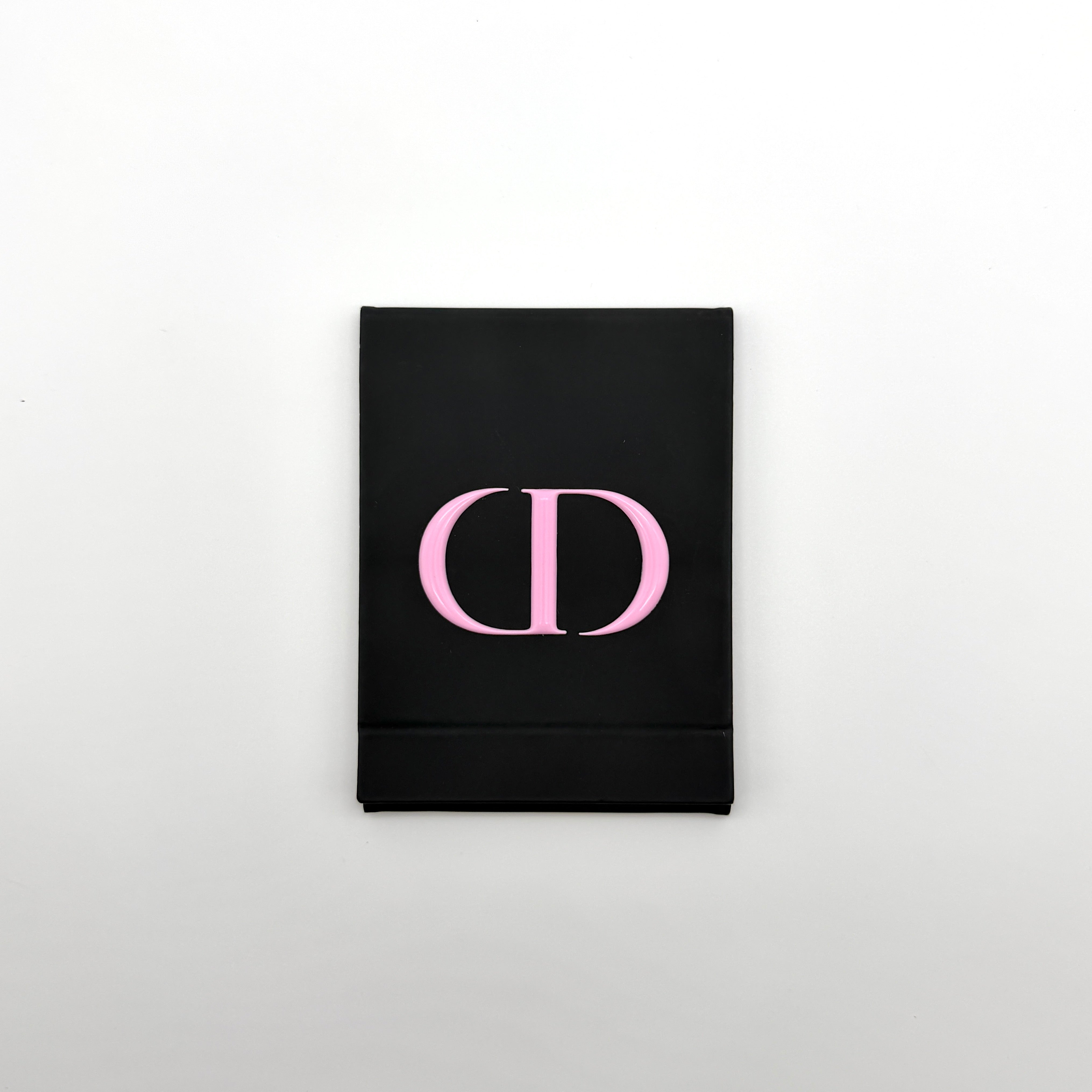 Dior folding mirror stand in black with pink CD logo and pink-framed mirror — pre-loved.