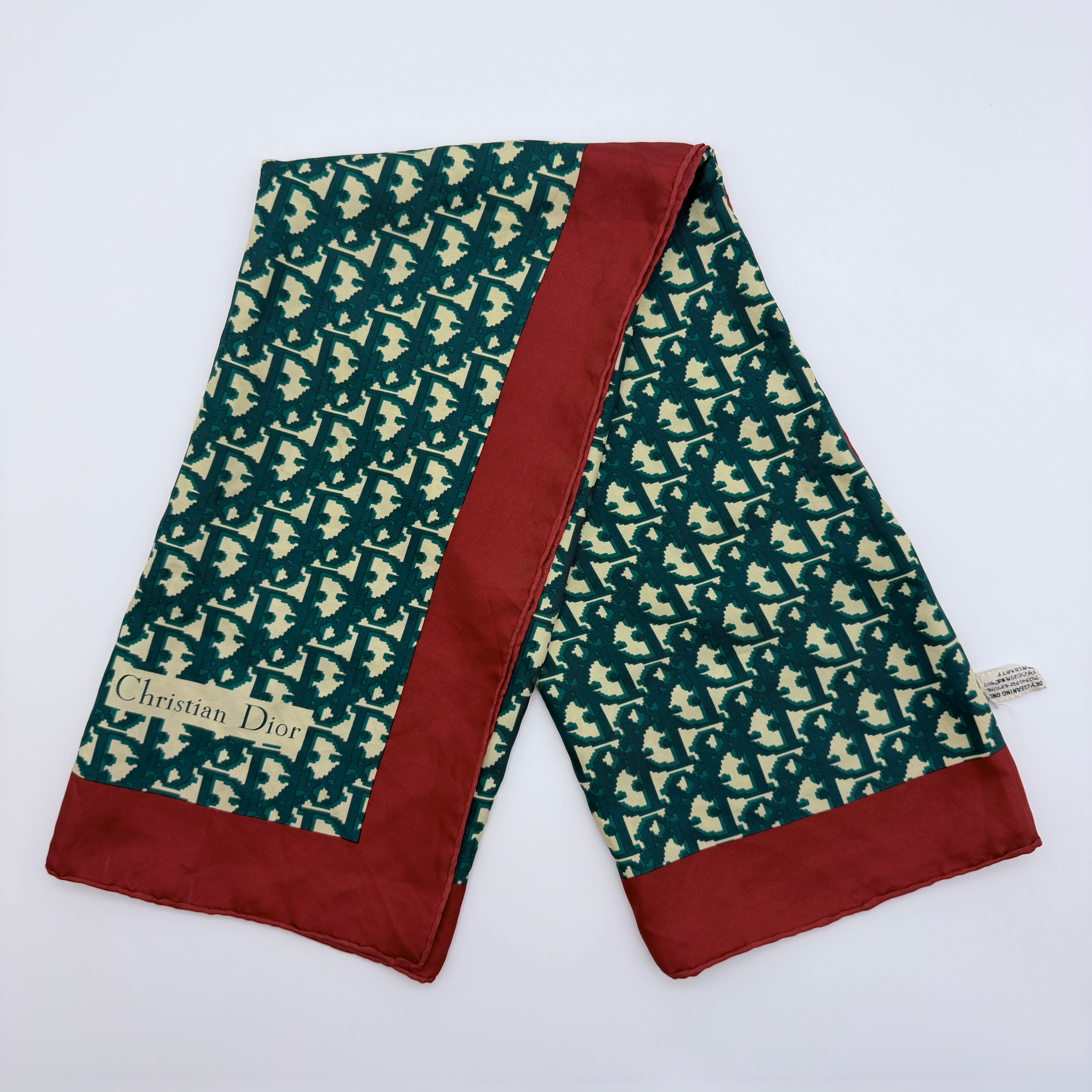 Dior monogram silk scarf in green with red contrast border and Christian Dior logo — pre-loved.