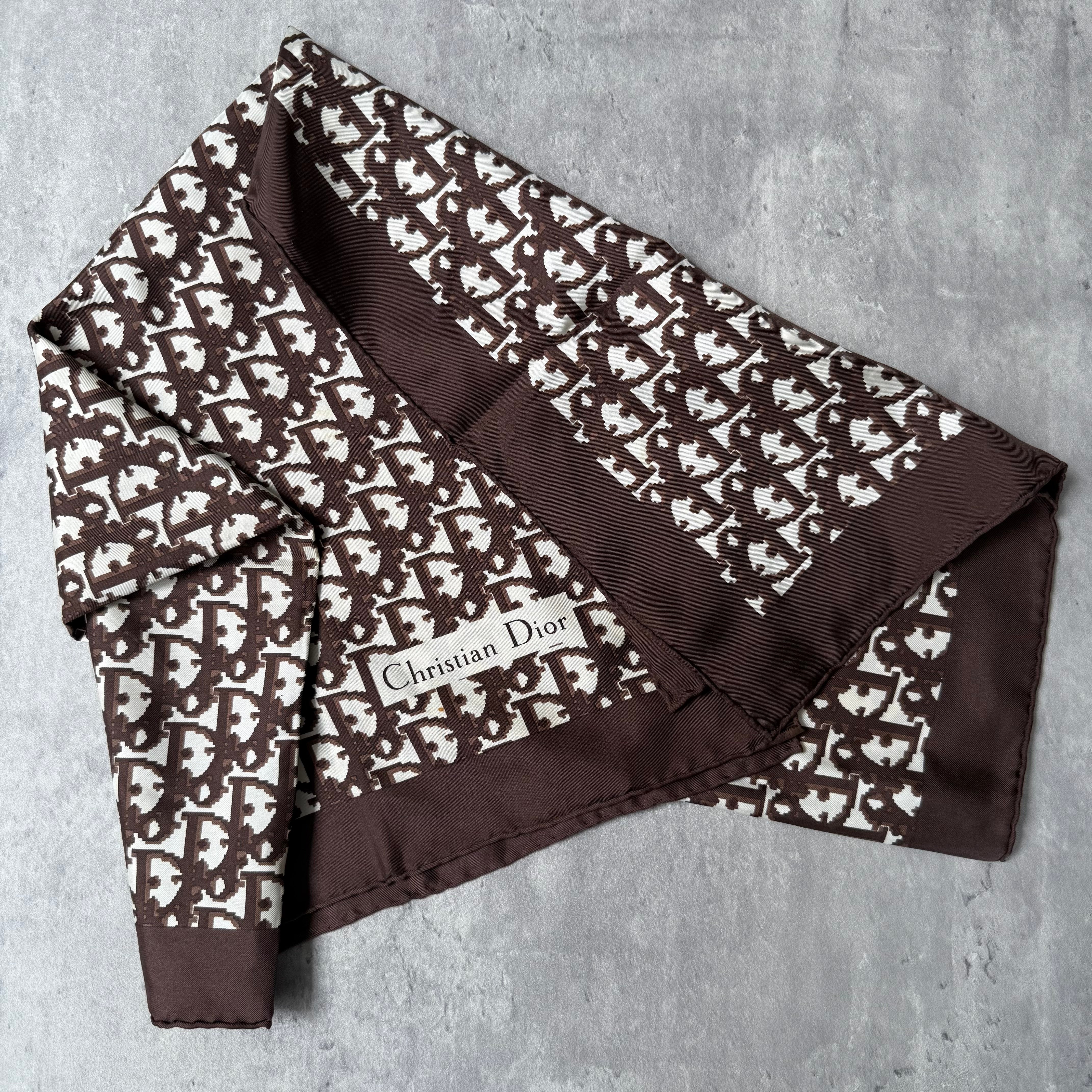 Dior Monogram Silk Scarf in brown with cream Oblique pattern and Christian Dior logo tag.