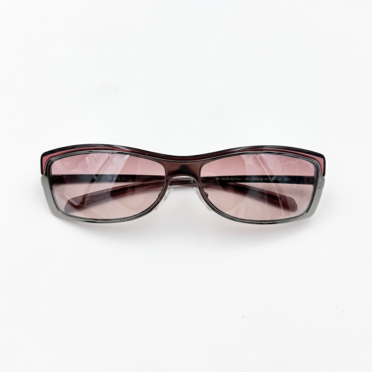 Gucci GG2689/S rectangle sunglasses in silver with pink gradient lenses, shown with case and cloth.