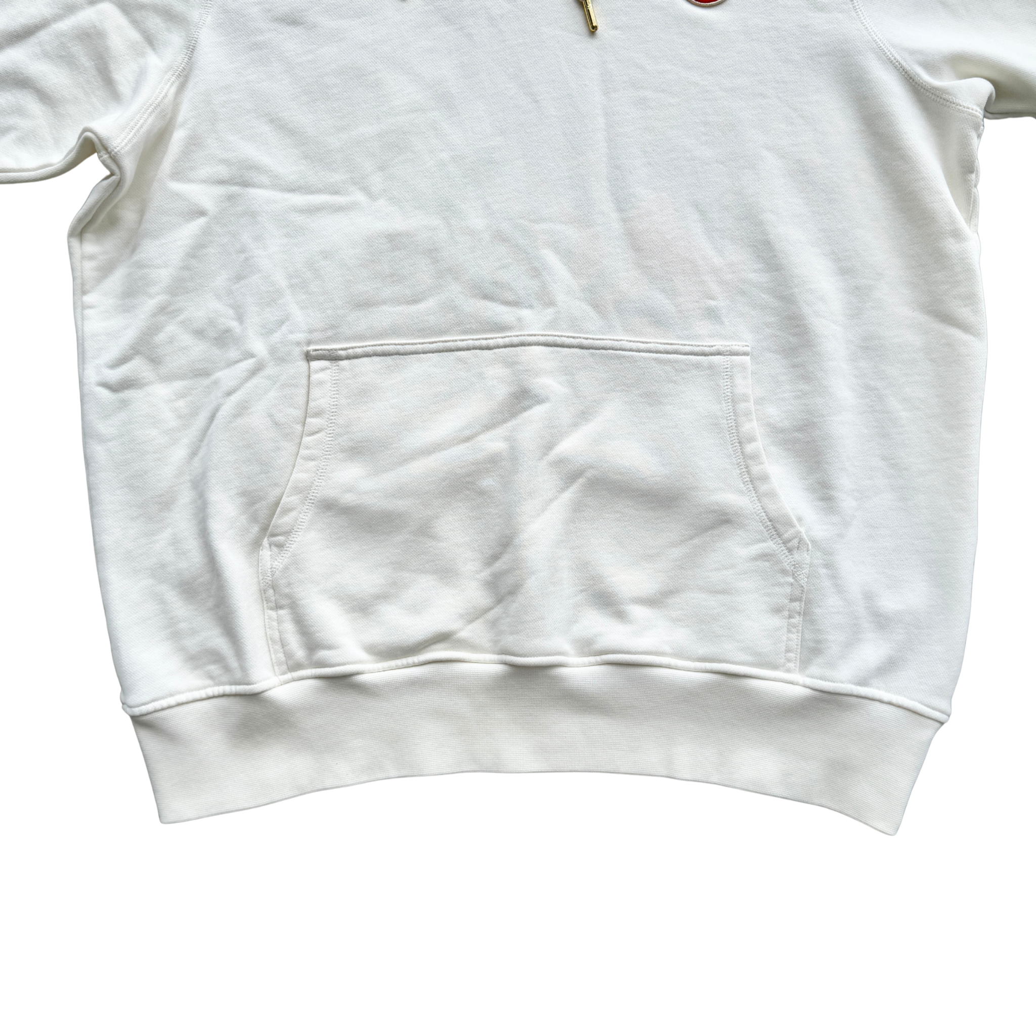 Casablanca off-white hoodie with a red logo patch and kangaroo pocket, laid flat and showing the front view.