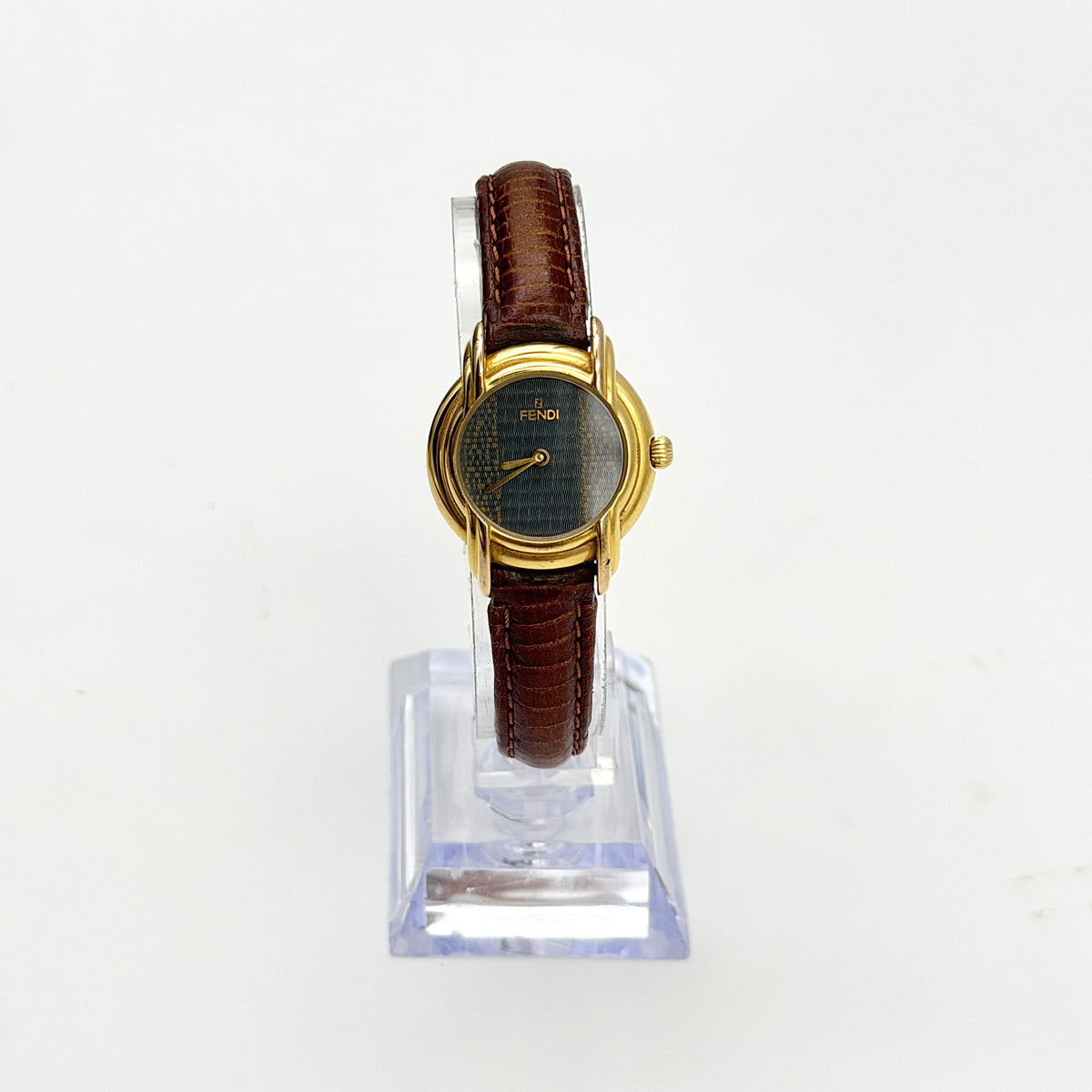 Fendi 350L Orologi Quartz Watch in gold with brown leather strap, displayed with original box and booklet.
