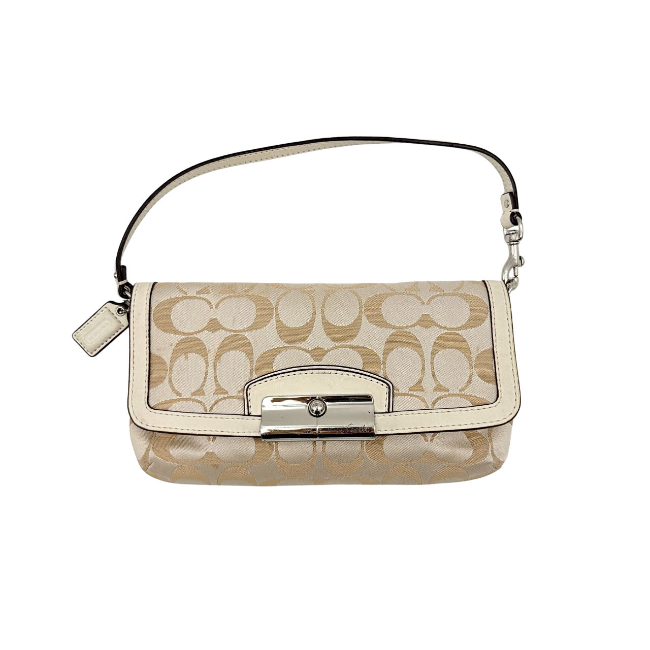 Coach Signature Kristin Shoulder Bag in beige and white jacquard canvas with white leather trim, presented with a polished silver push-lock clasp.
