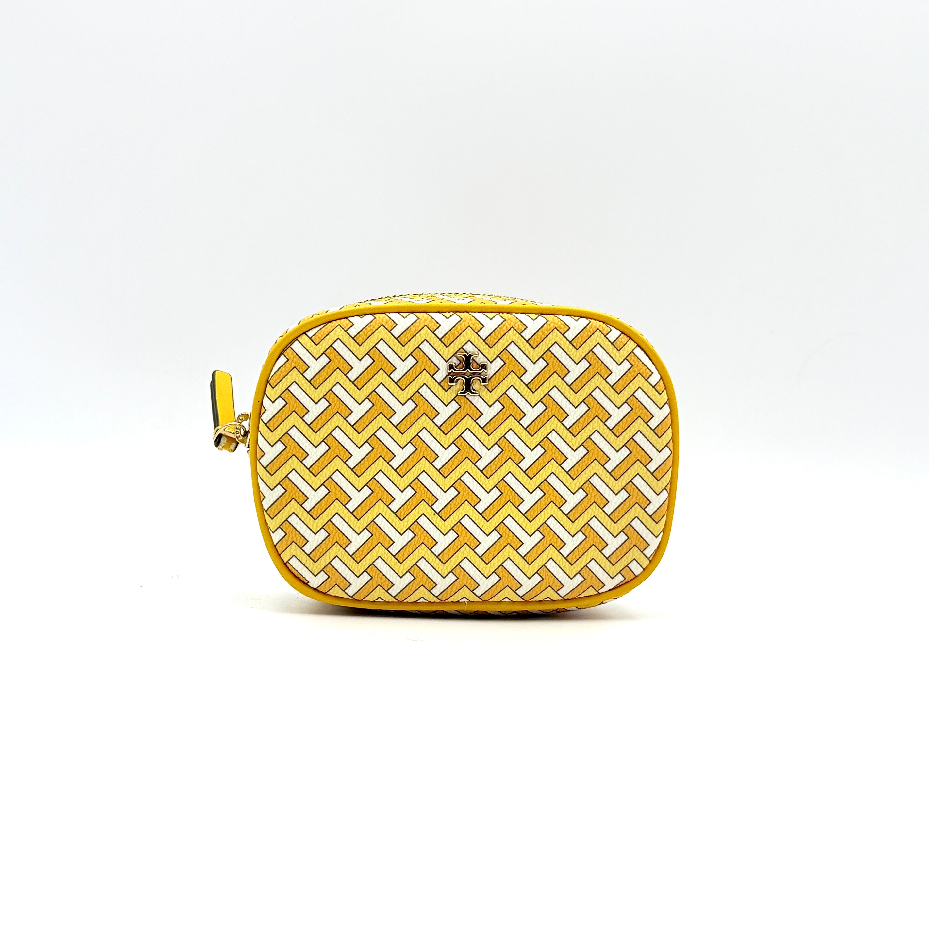 Tory Burch T Zag Cosmetic Pouch in yellow and white with gold-tone hardware, displayed against a clean white background.