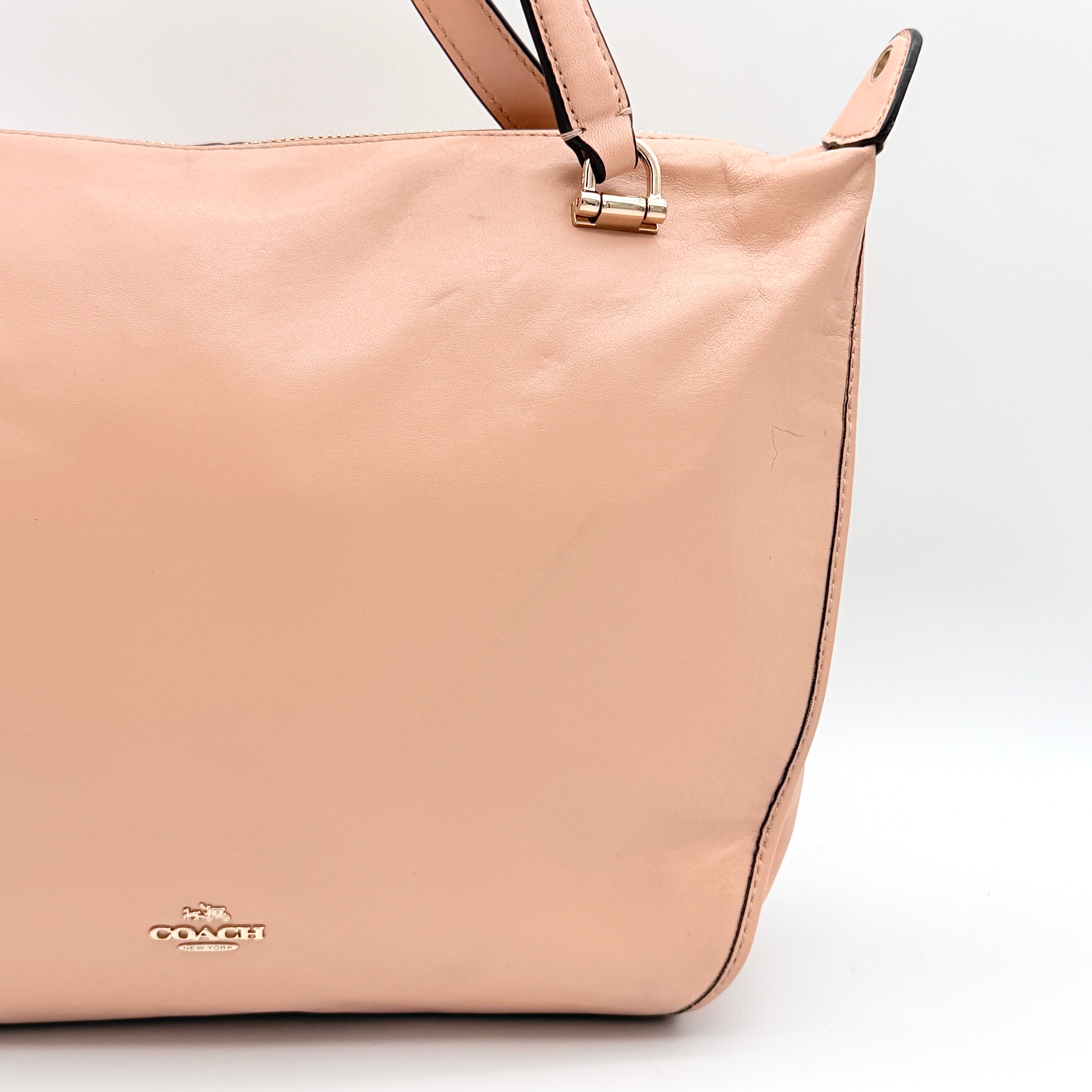 Coach Madison Smythe Satchel in blush pink leather with gold-tone hardware and detachable strap.
