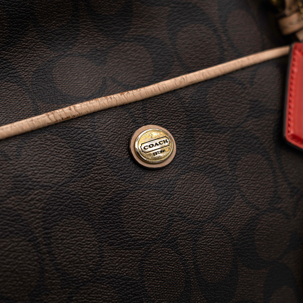 Coach Signature Peyton Pocket tote bag in brown canvas with tan leather trim, shown with both handles and detachable strap.