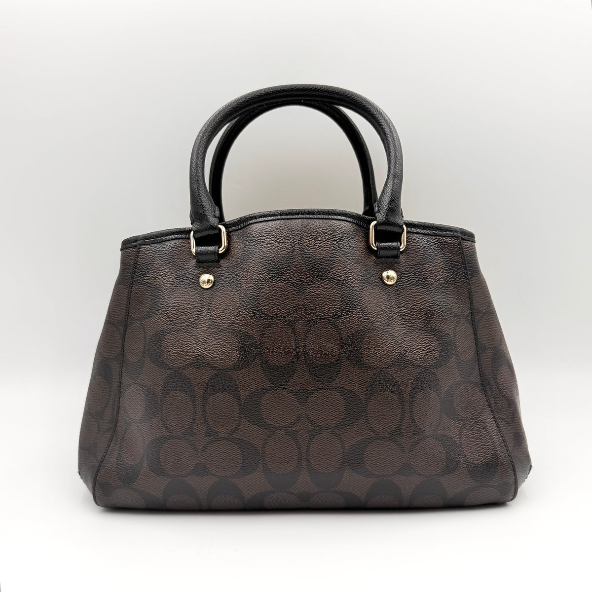 Coach 2Way Signature Margot Carryall Satchel in brown with black leather handles and gold hardware, shown with detachable strap.