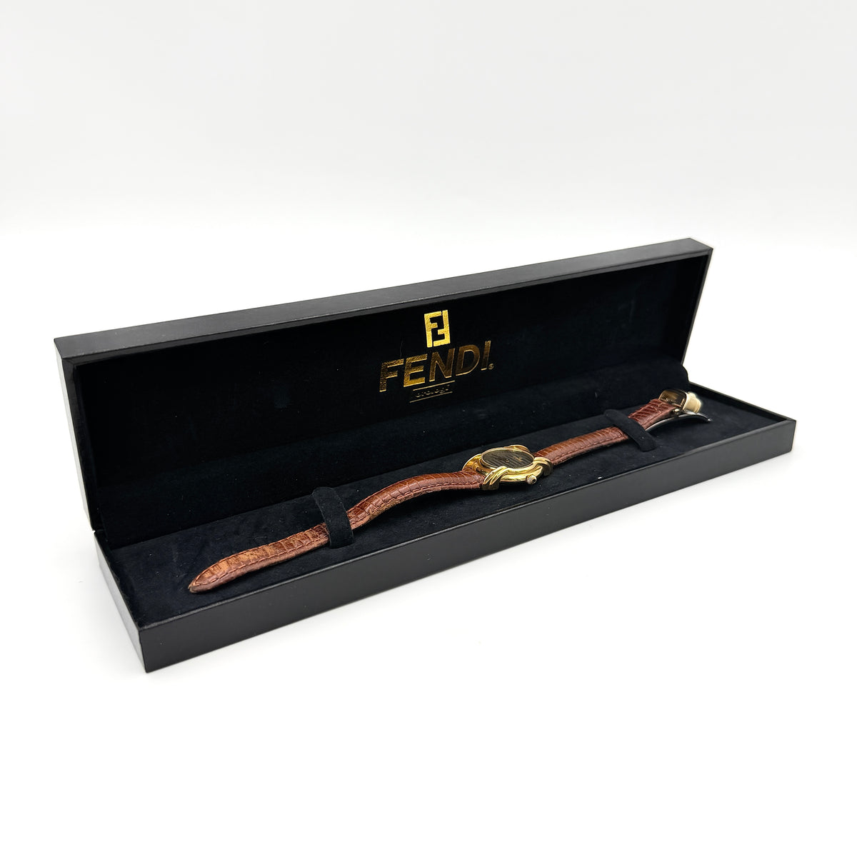 Fendi 350L Orologi Quartz Watch in gold with brown leather strap, displayed with original box and booklet.