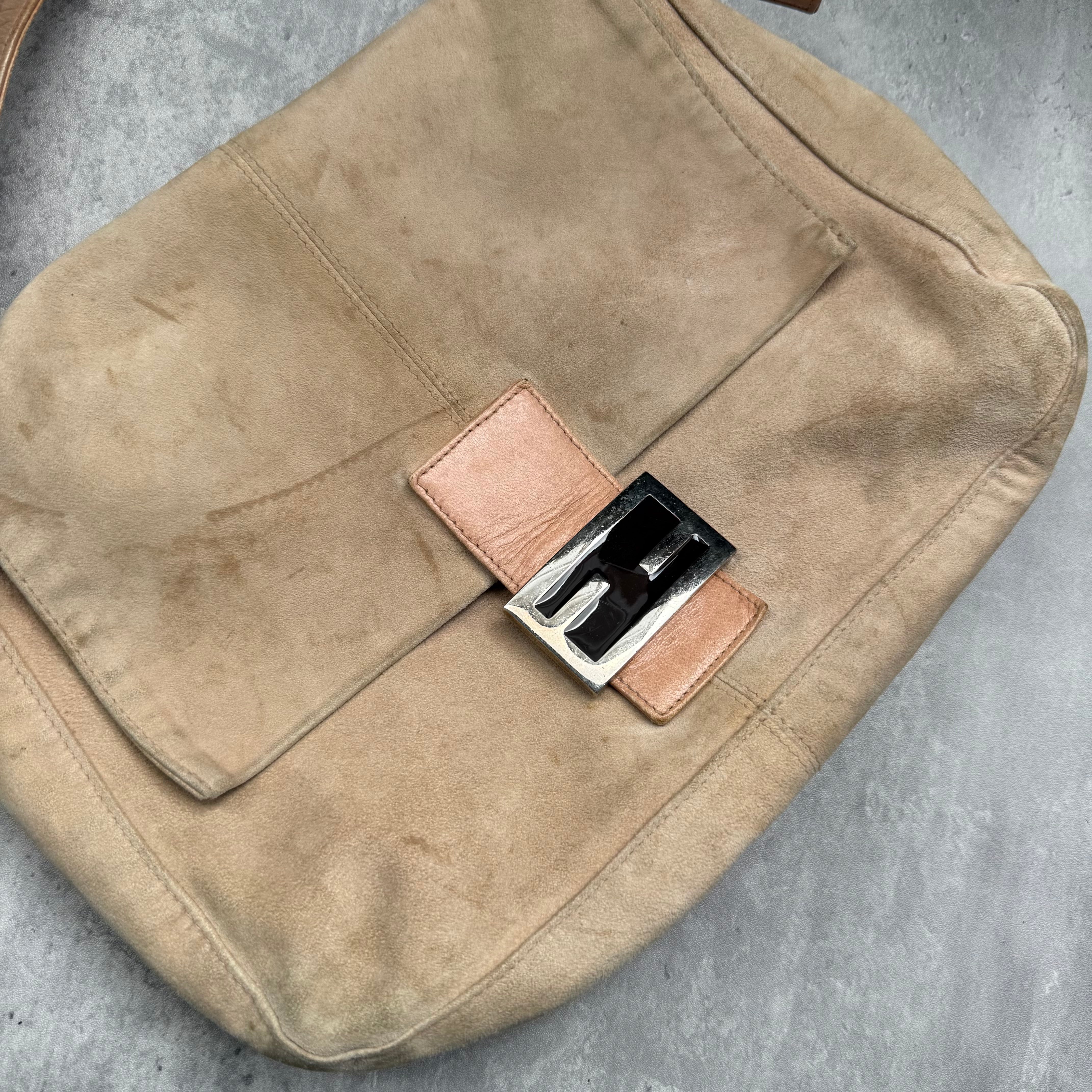 Fendi Mamma Baguette Shoulder Bag in nude suede with pink leather trim, silver FF buckle, and soft vintage structure.