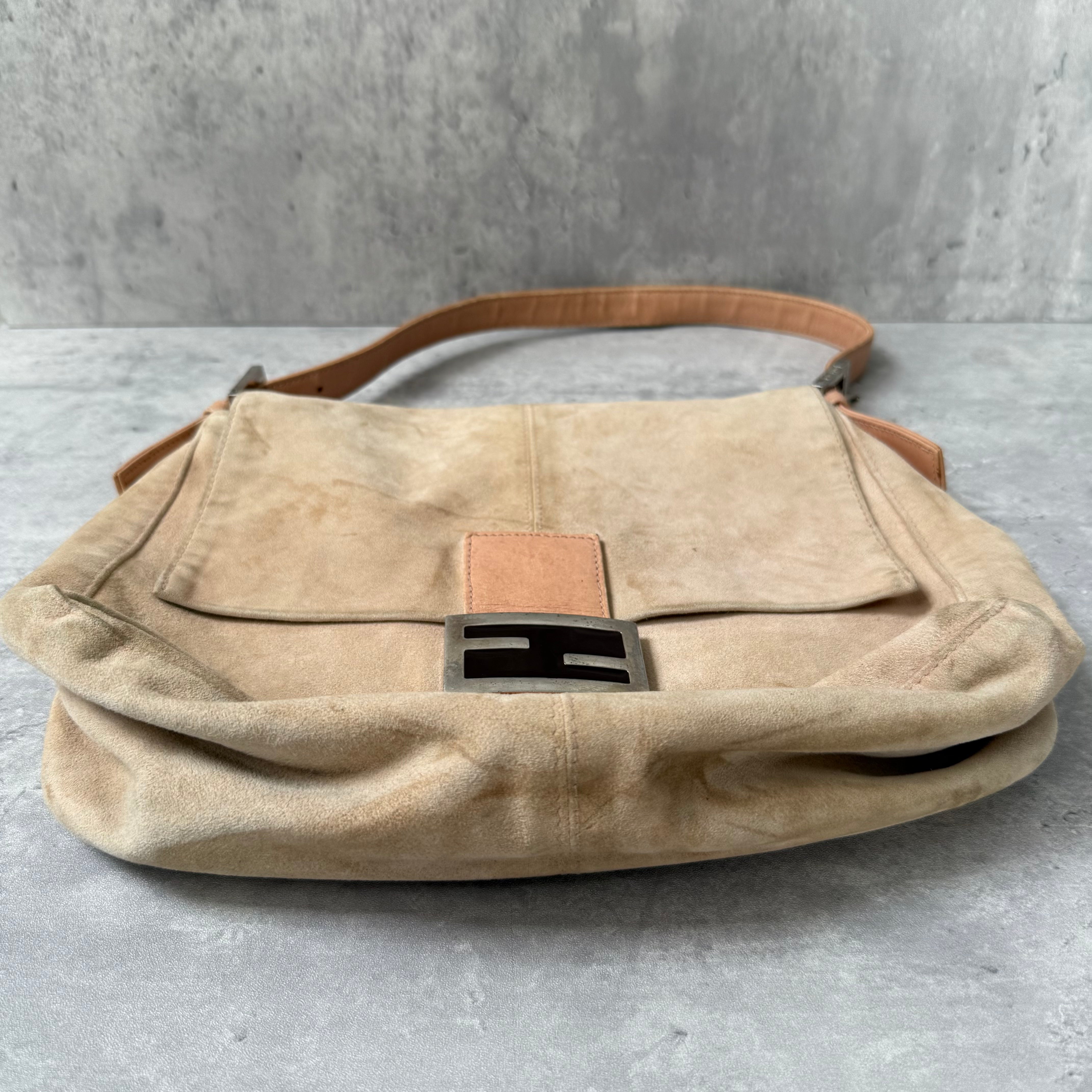 Fendi Mamma Baguette Shoulder Bag in nude suede with pink leather trim, silver FF buckle, and soft vintage structure.