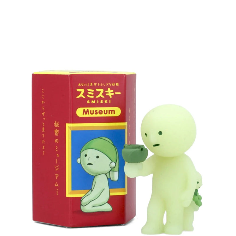 Smiski collectible figure, glow-in-the-dark mini character in quirky poses, perfect for shelves and desks.