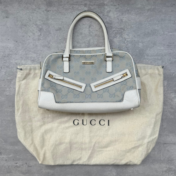 Gucci GG Canvas Boston Bowler Shoulder Bag in light blue with white leather trim, gold-tone hardware, and official Gucci dustbag