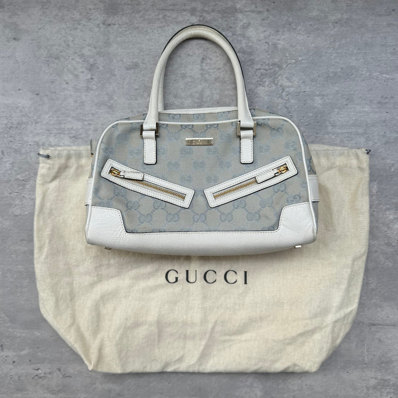 Gucci GG Canvas Boston Bowler Shoulder Bag in light blue with white leather trim, gold-tone hardware, and official Gucci dustbag