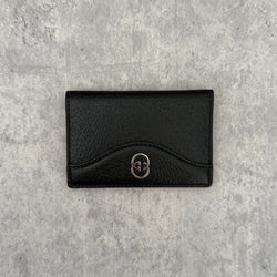 Gucci Interlocking G Black Leather Cardholder, featuring pebbled leather and silver-tone logo hardware in a slim bifold design
