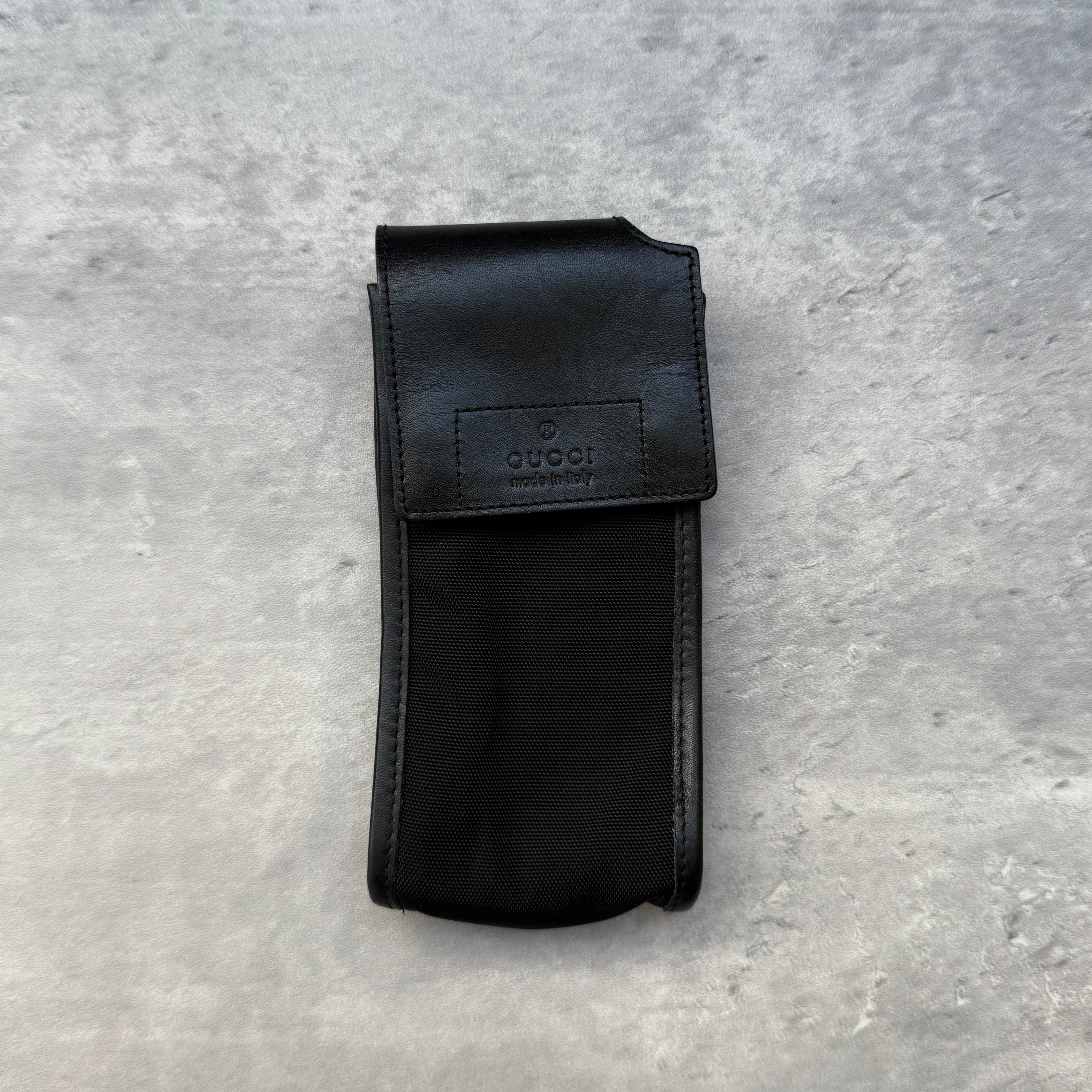 Gucci Vintage Y2K Accessory Case in black canvas with leather trim, featuring a Velcro flap closure and back strap design.