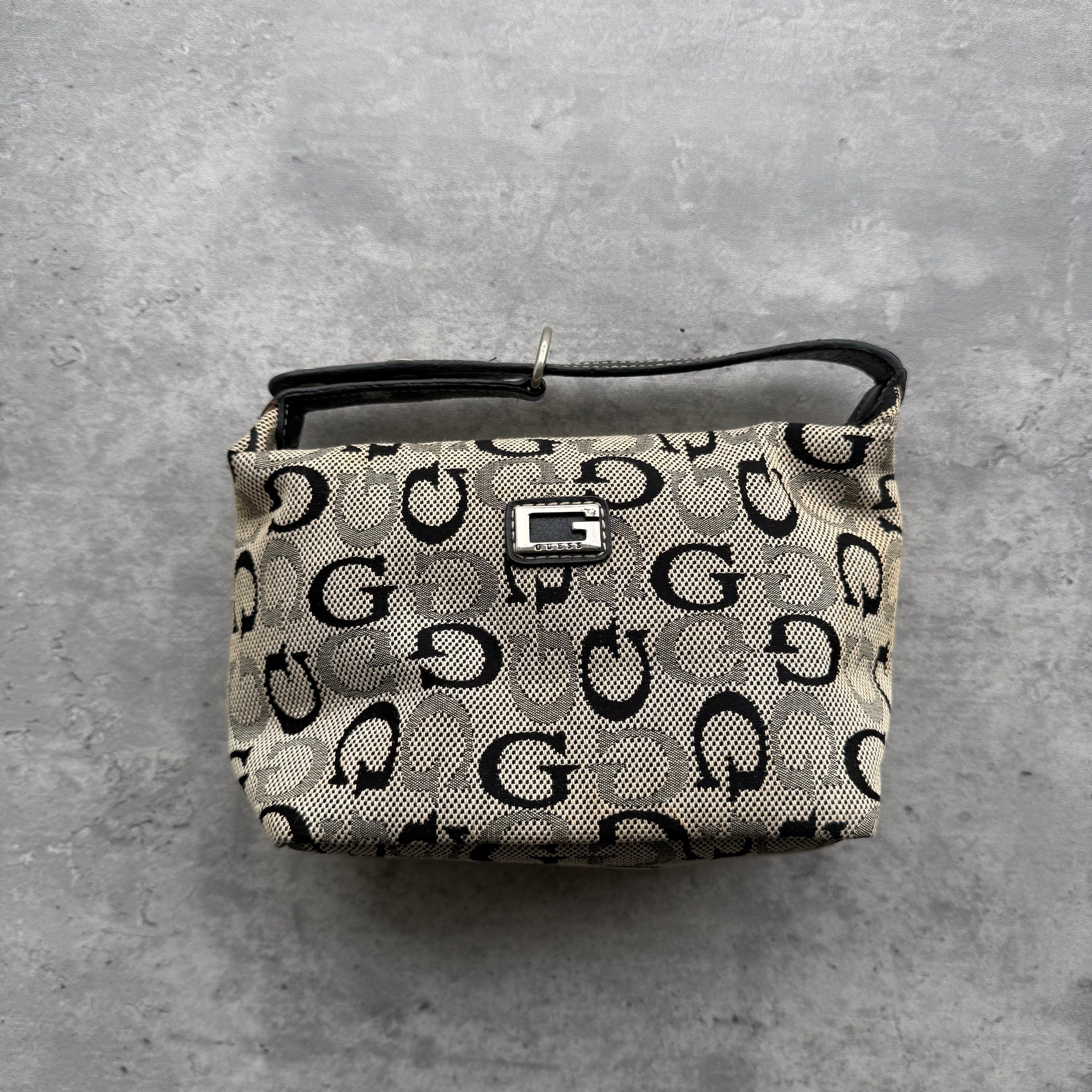 Guess Monogram Mini Hobo Shoulder Bag in grey and black canvas with leather trim and silver-tone G logo plaque.