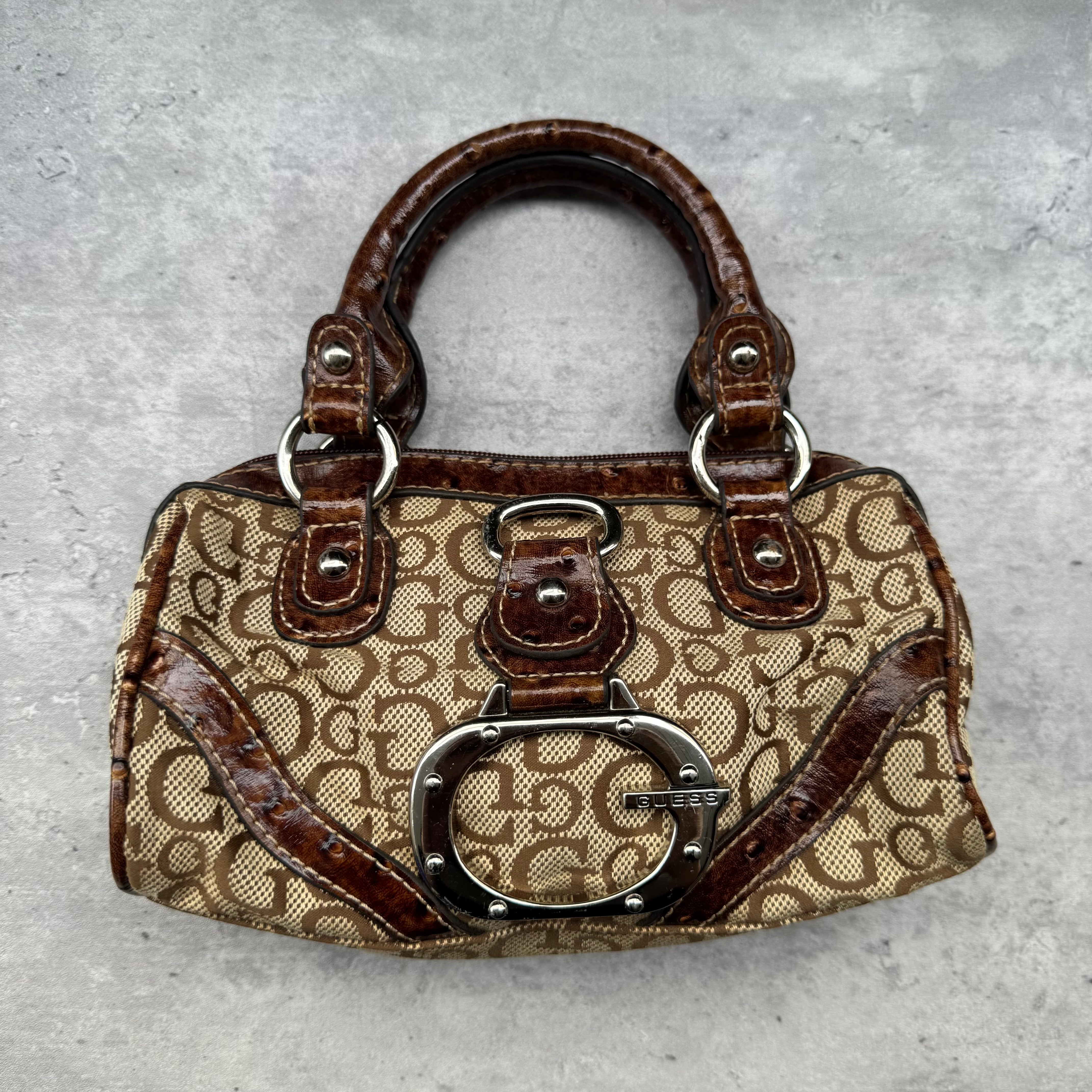 Guess Vintage 00s Monogram Y2K Bag in beige canvas with brown faux croc leather trim, silver-tone hardware, and leopard print lining.