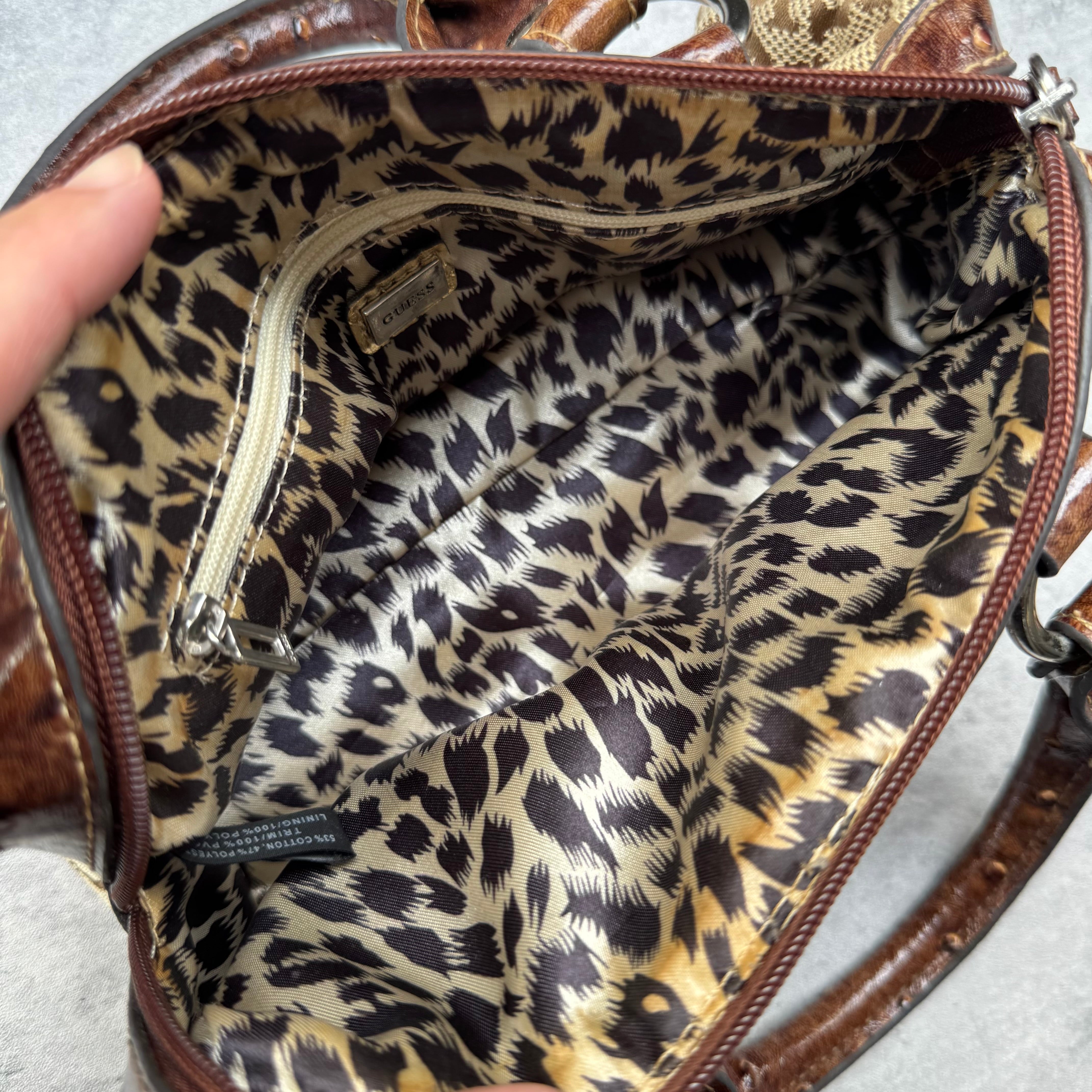 Guess Vintage 00s Monogram Y2K Bag in beige canvas with brown faux croc leather trim, silver-tone hardware, and leopard print lining.