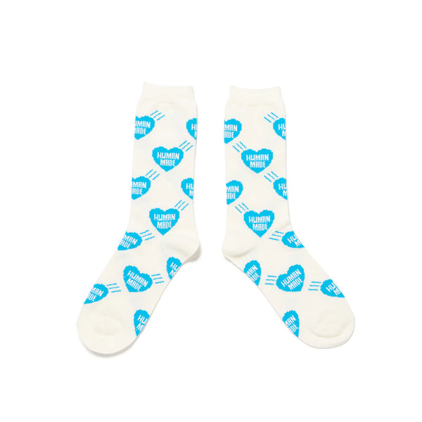 Human Made Long Socks Blue, featuring blue heart logo pattern on off-white cotton blend with ribbed cuffs and extended length.